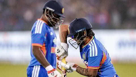 India's Ishan Kishan, right, arrives to bat as Sanju Samson walks off the field after his dismissal during the second T20I cricket match between India and New Zealand, on Friday, Jan. 23, 2026.