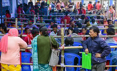 People wait in queues at a centre during hearings under the Special Intensive Revision (SIR) of electoral rolls, in Balurghat, Dakshin Dinajpur district, West Bengal, Tuesday, Jan. 20, 2026.