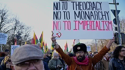 Protesters participate in a demonstration in support of the nationwide mass protests in Iran against the government in Berlin, Germany, Sunday, Jan. 18, 2026.