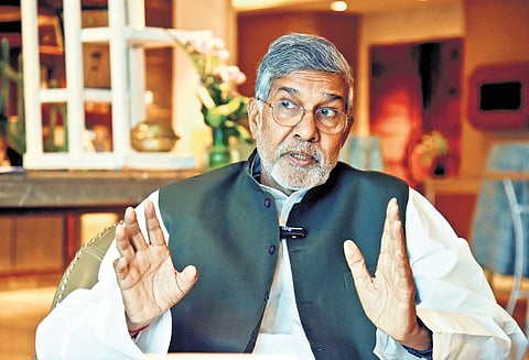 Nobel Laureate Kailash Satyarthi gestures while interacting with TNIE during the launch of his book, Karuna, in Hyderabad on Friday.