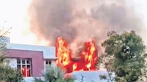 Fire engulfs house in a layout owned by BJP leaders G Janardhana Reddy and B Sriramulu in Ballari city on Friday.