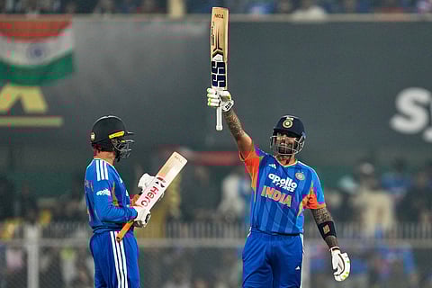 India's captain Suryakumar Yadav, right, celebrates his fifty as batting partner Abhishek Sharma applauds during the third T20 cricket match between India and New Zealand in Guwahati, India, Sunday, Jan. 25, 2026.
