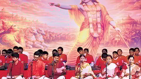 Artists along with students from Devnar Blind School take part in Samashti Gita Chanting, marking 75 years of the Chinmaya Movement at NTR Stadium in Hyderabad on Sunday.