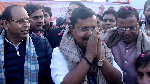 BJP National President Nitin Nabin with Union Minister of State and Uttar Pradesh party President Pankaj Chaudhary, right, being welcomed by party workers during an event, at the DND flyway, in Noida, Sunday, Jan. 25, 2026.