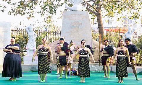 Artistes from New Zealand perform the Maori Haka at the tribal museum in Medaram village, Mulugu district, on Monday.