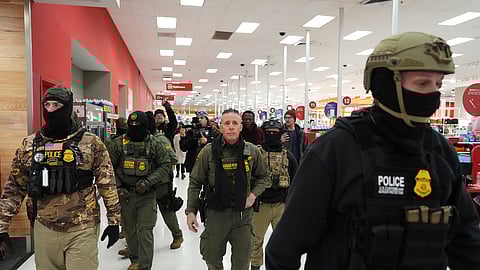 FILE - U.S. Border Patrol Cmdr. Gregory Bovino walks through a Target store Jan. 11, 2026, in St. Paul, Minn