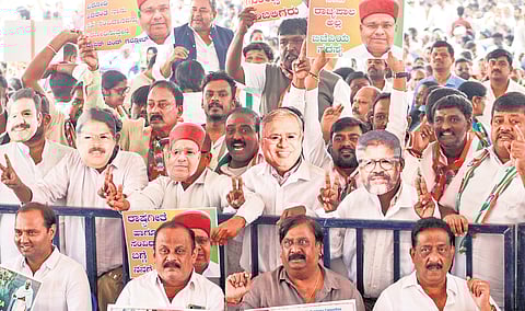 Congress leaders and supporters protest against the Union Government’s decision to replace MGNREGA with VB-G RAM G, at Freedom Park in Bengaluru on Tuesday