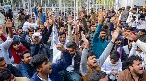 Lucknow: Students stage a protest against the new University Grants Commission (UGC) regulations, near University of Lucknow, Tuesday, Jan. 27, 2026.