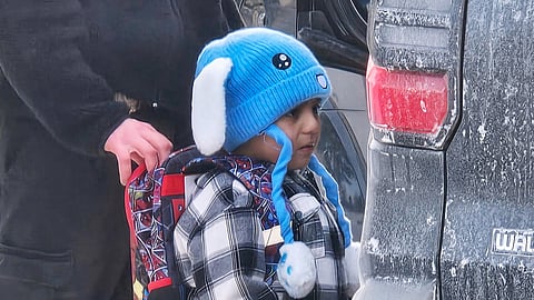 Liam Conejo Ramos, 5, is detained by U.S. Immigration and Customs Enforcement officers after arriving home from preschool, Tuesday, Jan. 20, 2026, in a Minneapolis suburb.