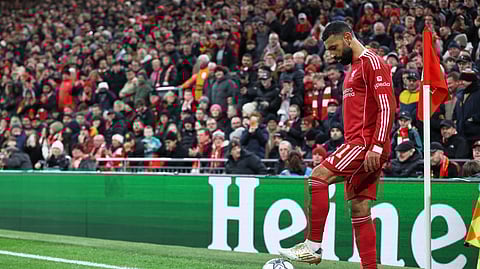 Liverpool's Mohamed Salah prepares to execute a corner kick during the Champions League soccer match between Liverpool and Qarabag in Liverpool, Wednesday, Jan. 28, 2026.