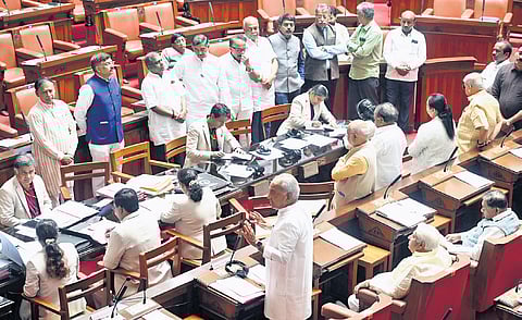BJP and JDS MLCs protest in the well of the Council in Vidhana Soudha on Thursday. (Representative image)