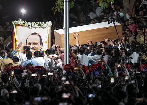 Family members and supporters gather as the mortal remains of the late Maharashtra Deputy Chief Minister Ajit Pawar arrive at the Vidya Pratishthan College ground for public homage, at Baramati in Pune district, Wednesday, Jan. 28, 2026.