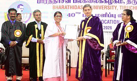Madras High Court Justice R N Manjula receives her PhD from Governor RN Ravi during BDU’s 40th convocation in Tiruchy on Wednesday.