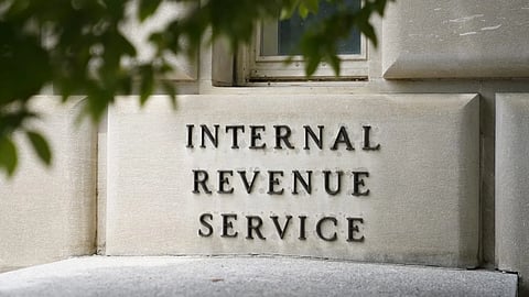FILE - A sign is displayed outside the Internal Revenue Service building May 4, 2021, in Washington