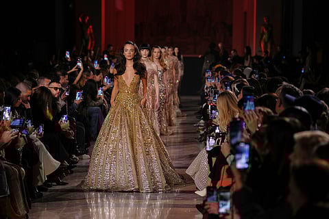 Models wear creations as part of the Elie Saab Spring/Summer 2026 Haute Couture collection.