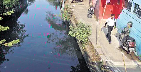 Market canal remains in poor condition due to lack of maintenance.