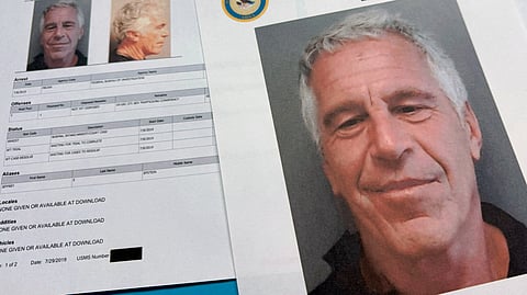 Documents that were included in the U.S. Department of Justice release of the Jeffrey Epstein files are photographed Friday, Jan. 2, 2026.