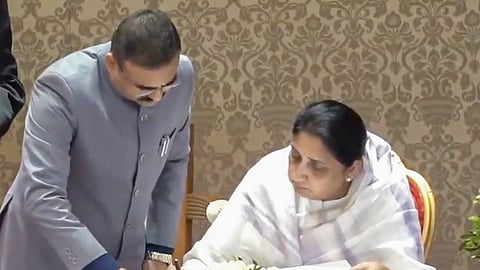 In this screengrab from a video posted on Jan. 31, 2026, Rajya Sabha MP Sunetra Pawar, wife of late NCP chief Ajit Pawar, signs documents after taking oath as Maharashtra's first woman Deputy Chief Minister during a ceremony at Lok Bhavan, in Mumbai.