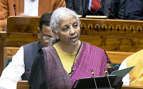 Finance Minister Nirmala Sitharaman presents the 'Union Budget 2026-27' in the Lok Sabha, in New Delhi, Sunday, Feb. 1, 2026.