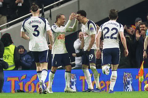 Tottenham's Dominic Solanke (19) is congratulated after scoring his side's 2nd goal during the English Premier League soccer match between Tottenham Hotspur and Manchester City in London, Sunday, Feb. 1, 2026.
