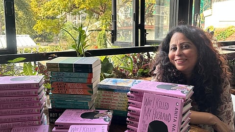 Anita Nair with copies of Why I Killed My Husband and Other Such Stories