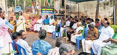 Residents and panchayat authorities during the protest staged in front of the shelter in Karumkulam panchayat in Thiruvananthapuram on Tuesday