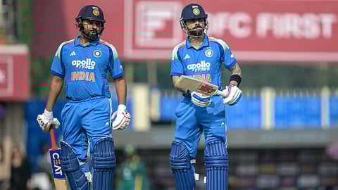 India's Virat Kohli (R) and Rohit Sharma.