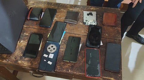 Police have seized one laptop, 21 mobile phones, 20 SIM cards of various companies, and 20 debit and credit cards belonging to different banks from the accused.