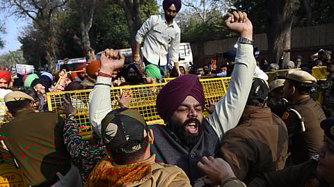 BJP workers participate in a protest march against Leader of Opposition in the Lok Sabha Rahul Gandhi for calling Union MoS Ravneet Singh Bittu a traitor in the Parliament House complex, in New Delhi, Wednesday, Feb. 4, 2026.