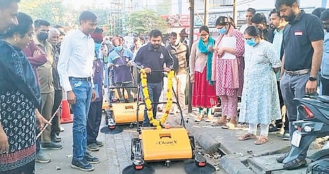 North City Corporation Commissioner Pommala Sunil Kumar operates a mechanical sweeper on Thursday.