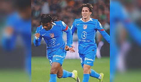 Ademola Lookman celebrates after scoring the third goal for Atletico Madrid during their Copa del Rey game against Real Betis.