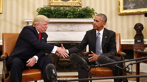 Former President Barack Obama shakes hands with then President-elect Donald Trump in the Oval Office.