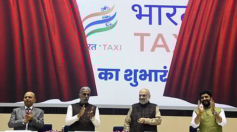 Union Cooperation Minister Amit Shah, centre, with Union Minister of State for Cooperation Krishan Pal Gurjar, left, and Union Minister of State for Civil Aviation Murlidhar Mohol, during the launch of Bharat Taxi, in New Delhi, Thursday, Feb. 5, 2026.