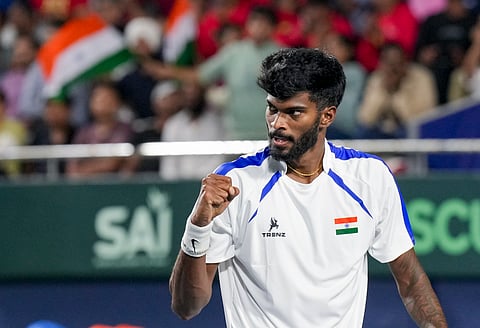 India's Dhakshineswar Suresh celebrates a point against Netherlands' Jesper De Jong, unseen, during the second singles match of the 2026 Davis Cup Qualifiers first round tie, at SM Krishna Tennis Stadium, in Bengaluru.