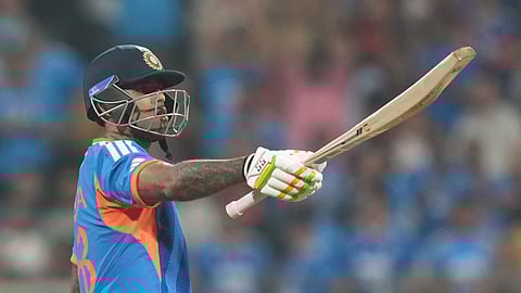 Suryakumar Yadav celebrates his fifty runs during the T20 World Cup cricket match between India and the United States in Mumbai.