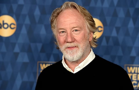 Actor Timothy Busfield smiles before an NFL football game in Detroit, Sept. 14, 2025.