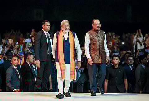 Prime Minister Narendra Modi and Malaysian Prime Minister Anwar Ibrahim during an Indian community event in Malaysia.