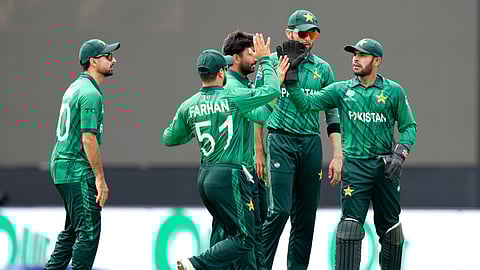 Pakistan's Usman Khan, right, celebrates with teammates after taking the catch to dismiss Netherlands' Max O'Dowd during the T20 World Cup cricket match between Netherlands and Pakistan in Colombo, Sri Lanka, Saturday, Feb. 7, 2026.
