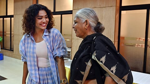 Bina Paul and Rima Kallingal exchange greetings at an event organised by the Network of Women in Media.