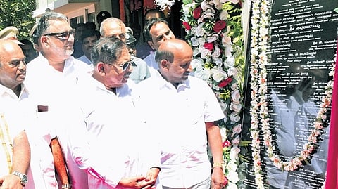 Home Minister Dr G Parameshwara inaugurates the new building of Siddhartha Nagar Traffic police station in Mysuru on Saturday.