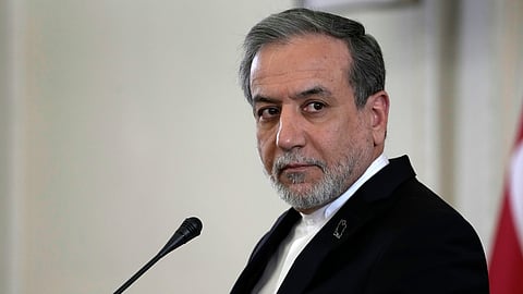 Iranian Foreign Minister Abbas Araghchi listens to a question in a press briefing in Tehran, Iran, Monday, Dec. 30, 2024.