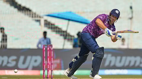 Scotland's George Munsey plays a shot during the T20 World Cup cricket match between Italy and Scotland in Kolkata, India, Monday, Feb. 9, 2026.
