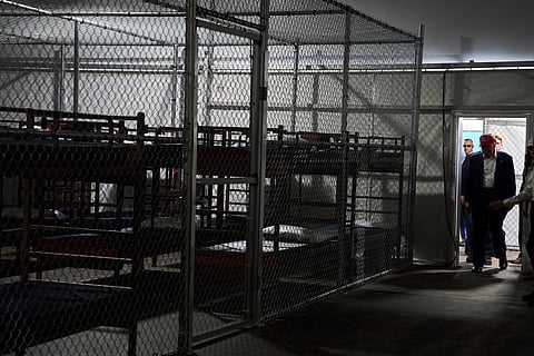 FILE - President Donald Trump tours "Alligator Alcatraz," a new migrant detention facility at Dade-Collier Training and Transition facility, on July 1, 2025, in Ochopee, Fla