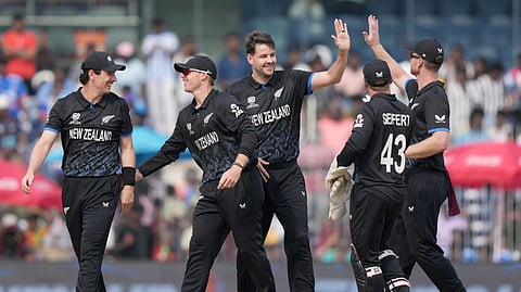 New Zealand's Jacob Duffy, center, celebrates with teammates the wicket of United Arab Emirates' Aryansh Sharma during the T20 World Cup cricket match between New Zealand and United Arab Emirates in Chennai, India, Tuesday, Feb. 10, 2026.
