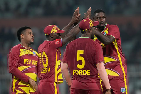 Jason Holder (Extreme R) celebrates with his teammates in the World Cup