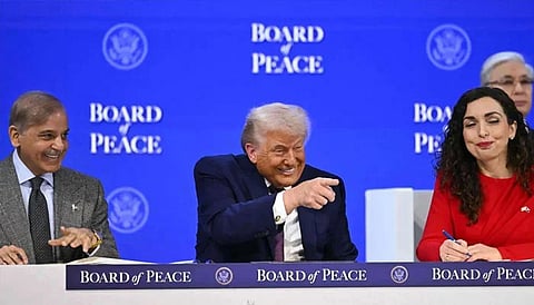 Pakistan PM Shehbaz Sharif (left) and Kosovo President Vjosa Osmani speak with US President Donald Trump at the Board of Peace meeting in Davos on January 22