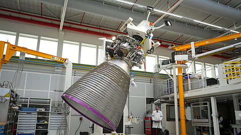 A mechanic works on the Vulcain 2.1 engine that powers the Ariane 64 rocket, at the ArianeGroup's plant in Vernon, west of Paris, Wednesday, Feb. 4, 2026.
