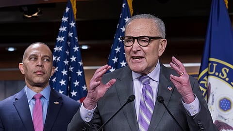 Senate Minority Leader Chuck Schumer, D-N.Y., center, speaks during a news conference as House Minority Leader Hakeem Jeffries, D-N.Y. listens, at the Capitol in Washington, Wednesday, Feb. 4, 2026.