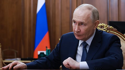 Russian President Vladimir Putin listens to Moscow Mayor Sergei Sobyanin during their meeting at the Kremlin in Moscow, Monday, Feb. 9, 2026.