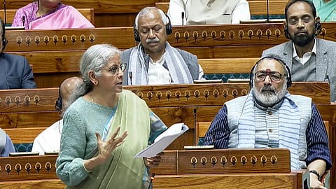 Union Finance Minister Nirmala Sitharaman speaks in the Lok Sabha during the Budget session of Parliament, in New Delhi, Wednesday, Feb. 11, 2026.